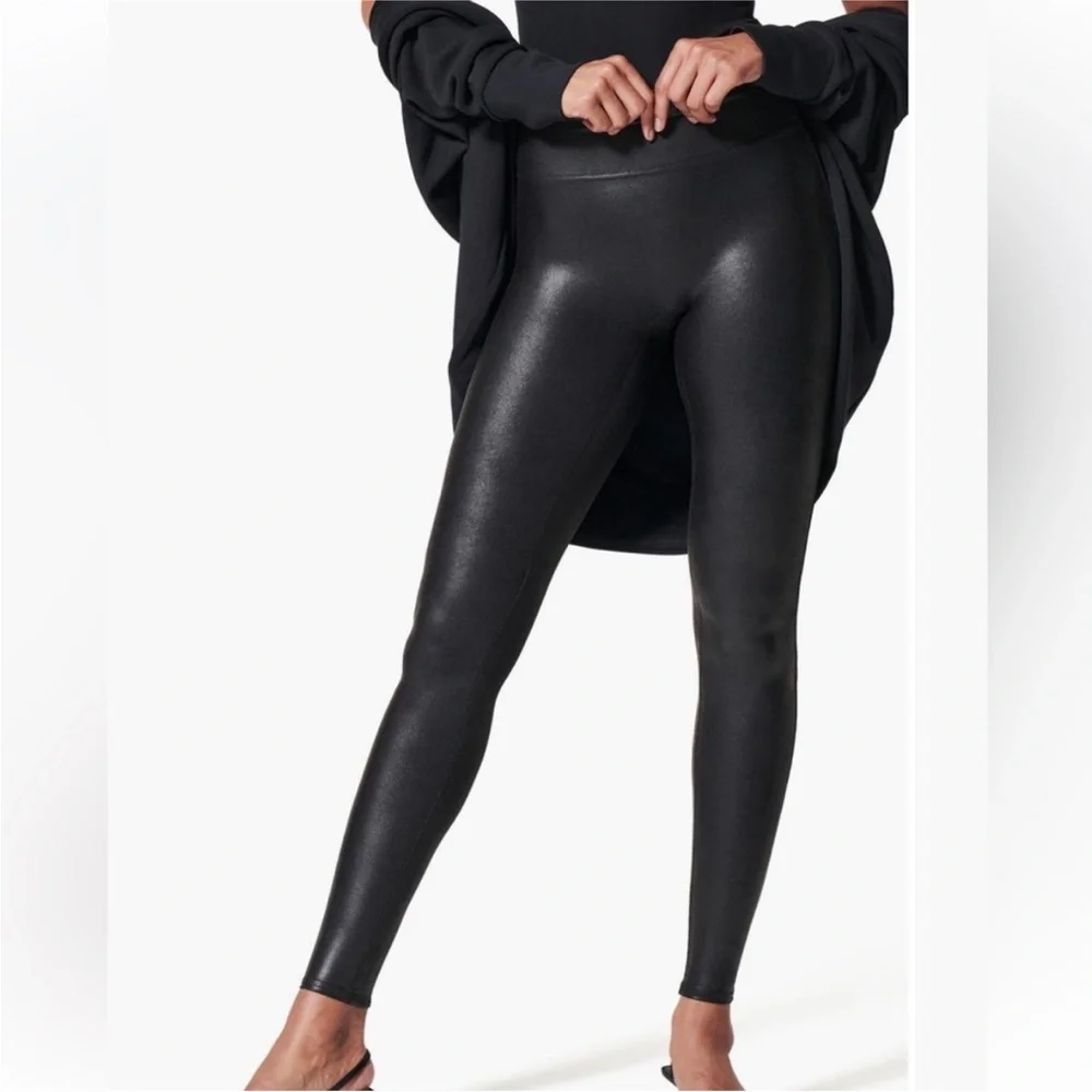 Spanx Women’s Black Faux Leather Leggings in a size Small.